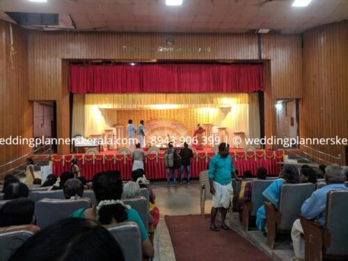 Kerala orrange marrygold stage decoration Kerala Wedding planners